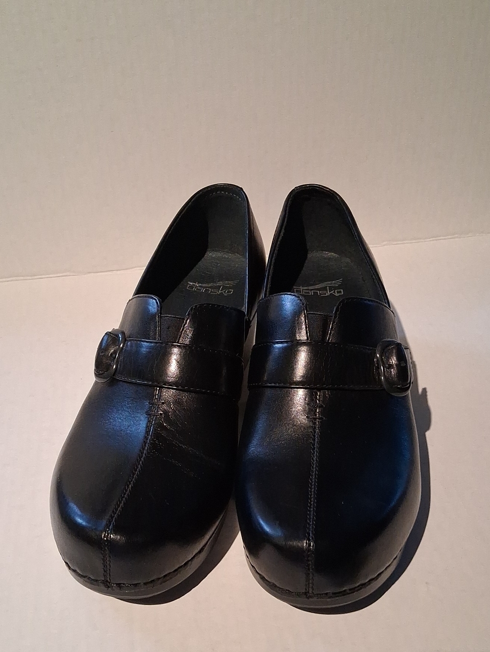 Dansko Woman's Black Leather  Slip-On Loafers with Buckle